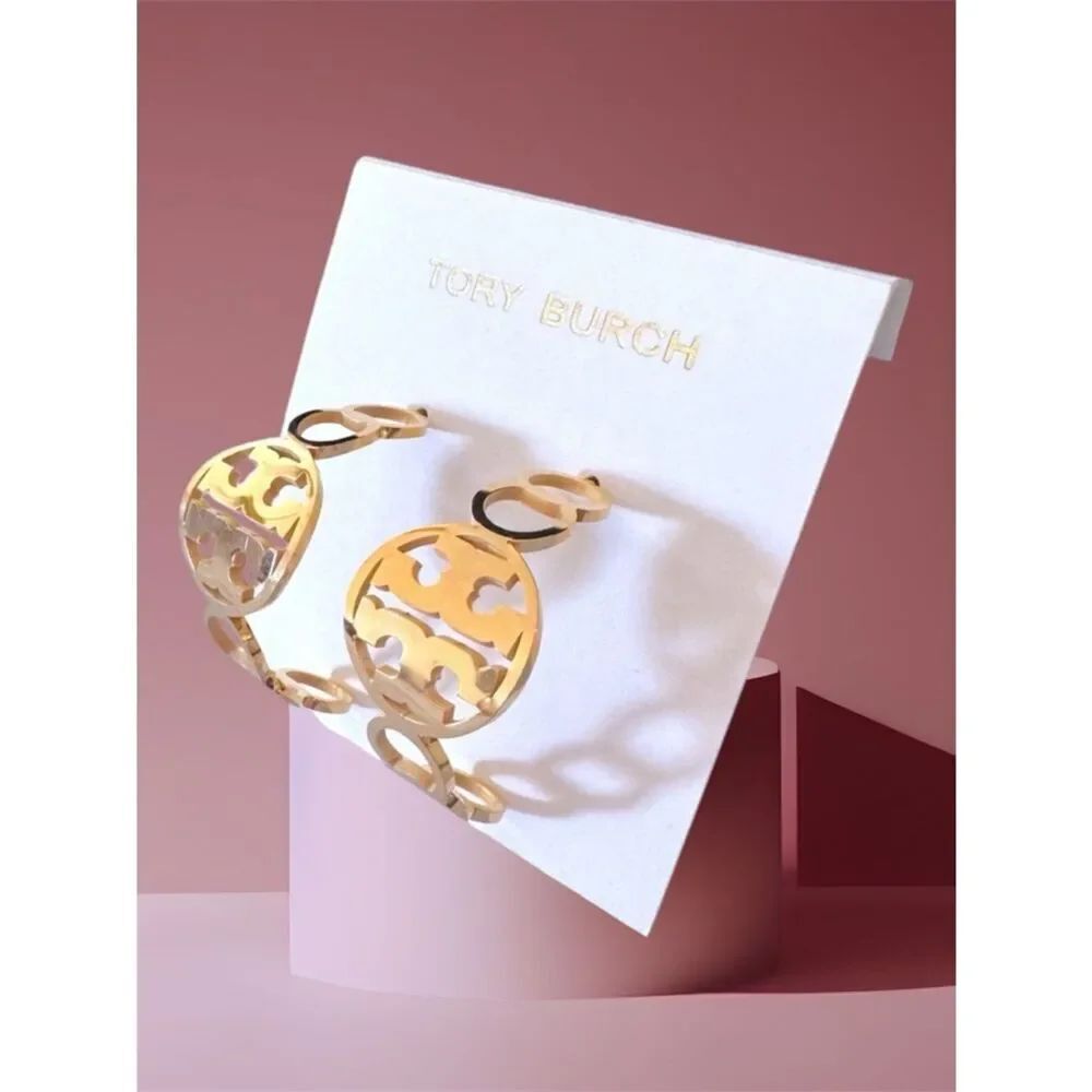 TORY BURCH GOLD HOOP STUD EARRINGS.
